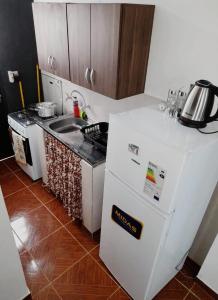 Kuchyň nebo kuchyňský kout v ubytování Apartamentos Victoria