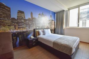 Rúm í herbergi á Hotel TÖTEM Guadalajara +19 myndir