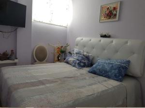 A bed or beds in a room at Penthouse ar okeana skatu Még 37 kép