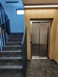 Fotografia z galérie ubytovania Uroczy apartament z miejscem na auto w garażu vo Varšave
