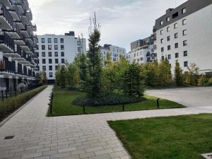Fotografia z galérie ubytovania Uroczy apartament z miejscem na auto w garażu vo Varšave
