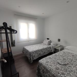 Posteľ alebo postele v izbe v ubytovaní Casa de la Ilusión