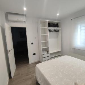 Posteľ alebo postele v izbe v ubytovaní Casa de la Ilusión