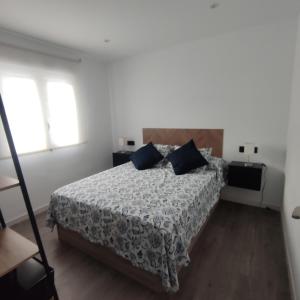 Posteľ alebo postele v izbe v ubytovaní Casa de la Ilusión