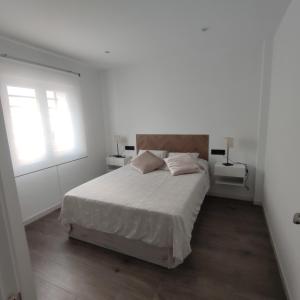 Posteľ alebo postele v izbe v ubytovaní Casa de la Ilusión
