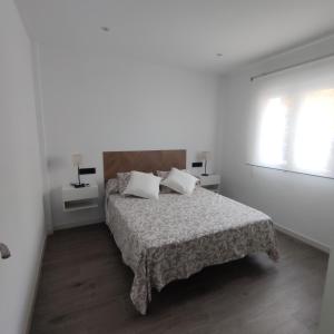 Posteľ alebo postele v izbe v ubytovaní Casa de la Ilusión