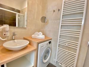 Et badeværelse på Steiner Residences Vienna Reumannplatz + 30 billeder