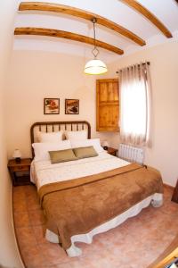 Posteľ alebo postele v izbe v ubytovaní Colonia Apartamento Rural
