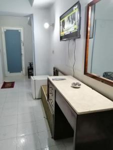 TV a/nebo společenská místnost v ubytování Windsor Hotel Luxor