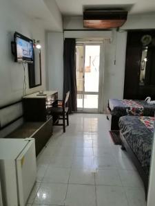 Postel nebo postele na pokoji v ubytování Windsor Hotel Luxor