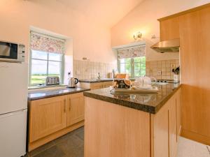 Η κουζίνα ή μικρή κουζίνα στο Pickle Cottage +14 φωτογραφίες