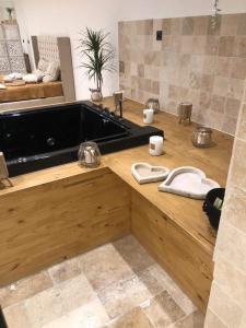 a kitchen with a sink and a counter top at BellaVilla 309 in Sarrians