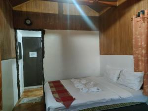 Postel nebo postele na pokoji v ubytování Reel Place