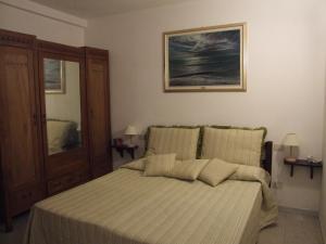 Кровать или кровати в номере Vacanze Toscane In The Country