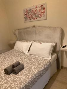 Postel nebo postele na pokoji v ubytování Antica Novi B & B