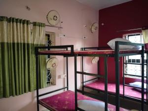 Voodi või voodid majutusasutuse UTKARSH HOTEL toas