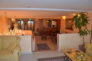 Posezení v ubytování Kalos Hotel