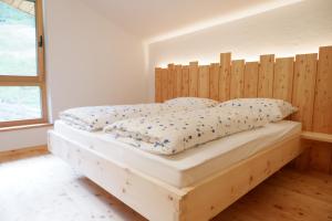 Posteľ alebo postele v izbe v ubytovaní Wolfhof_Ritten