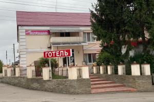a for sale sign in front of a building at Boguslavl' in Bohuslav