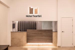 a lobby with a hotel market sign on the wall at Hotel Txartel in Lasarte +47 photos