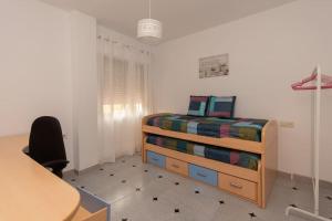 Televízia a/alebo spoločenská miestnosť v ubytovaní Precioso piso de 3 dormitorios, cocina y 1 baño
