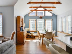 a living room with a table and chairs at Eleanor Cottage in Ballater