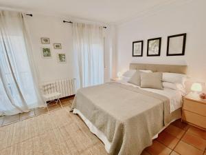 Llit o llits en una habitació de Villa Rosanna