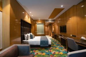 Posezení v ubytování Ramada Plaza by Wyndham Jammu Vijaypur