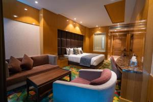 Posezení v ubytování Ramada Plaza by Wyndham Jammu Vijaypur