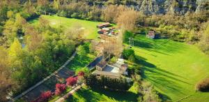 an aerial view of a house in a field at Alojamiento Rural El Molino de Butrera in Butrera