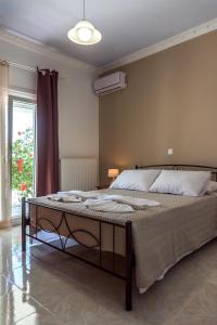 A bed or beds in a room at Vigere Luxury Villa