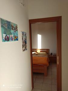 Posteľ alebo postele v izbe v ubytovaní Residenza Scikkettosa