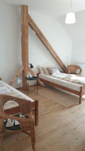 a living room with two beds and a couch at StudioRasnov in Râşnov