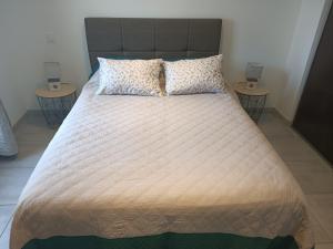 Postel nebo postele na pokoji v ubytování l appart