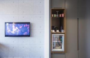 TV a/nebo společenská místnost v ubytování Zeniva Hotel