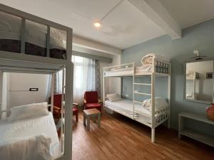 Postel nebo postele na pokoji v ubytování Mellow Fellow Hostel + 37 fotografií