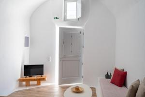Telewizja i/lub zestaw kina domowego w obiekcie Karpimo Suites
