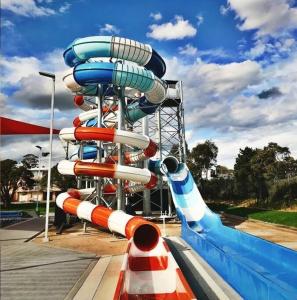 a water slide in a water park at Grandview Melbourne Executive 2BR Apartment in Melbourne