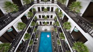 an overhead view of a building with a swimming pool at Hoi An Delicacy Hotel & Spa in Hoi An