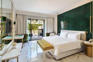 Postel nebo postele na pokoji v ubytování Rixos Premium Saadiyat Island - All Inclusive