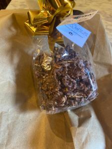 a package of nuts sitting on top of a table at Casa Rural La Corrada in Llamoso