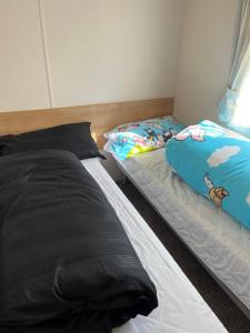 Postel nebo postele na pokoji v ubytování 707 Seawick