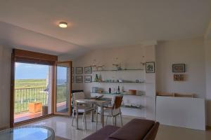 Kuchyň nebo kuchyňský kout v ubytování Agra de Corrubedo by Serendipia Turismo