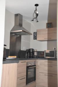 Köök või kööginurk majutusasutuses Le Horsier