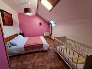 Posteľ alebo postele v izbe v ubytovaní Gîte des Tannières