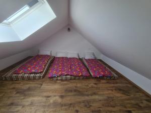 Posteľ alebo postele v izbe v ubytovaní Gîte des Tannières