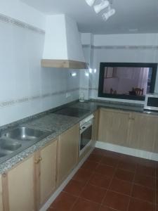 Η κουζίνα ή μικρή κουζίνα στο Via de Jardin 10 casa 20