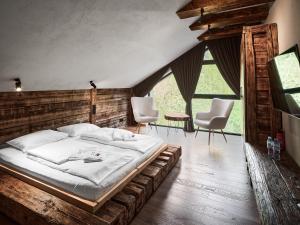 מיטה או מיטות בחדר ב-Poczuj Spokój Szczyrk - Free Sauna & Balia