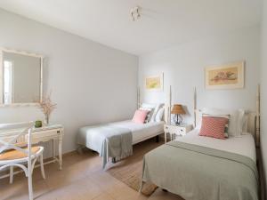 Posteľ alebo postele v izbe v ubytovaní Beachfront San Agustin Papagayos II