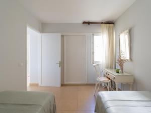 Posteľ alebo postele v izbe v ubytovaní Beachfront San Agustin Papagayos II